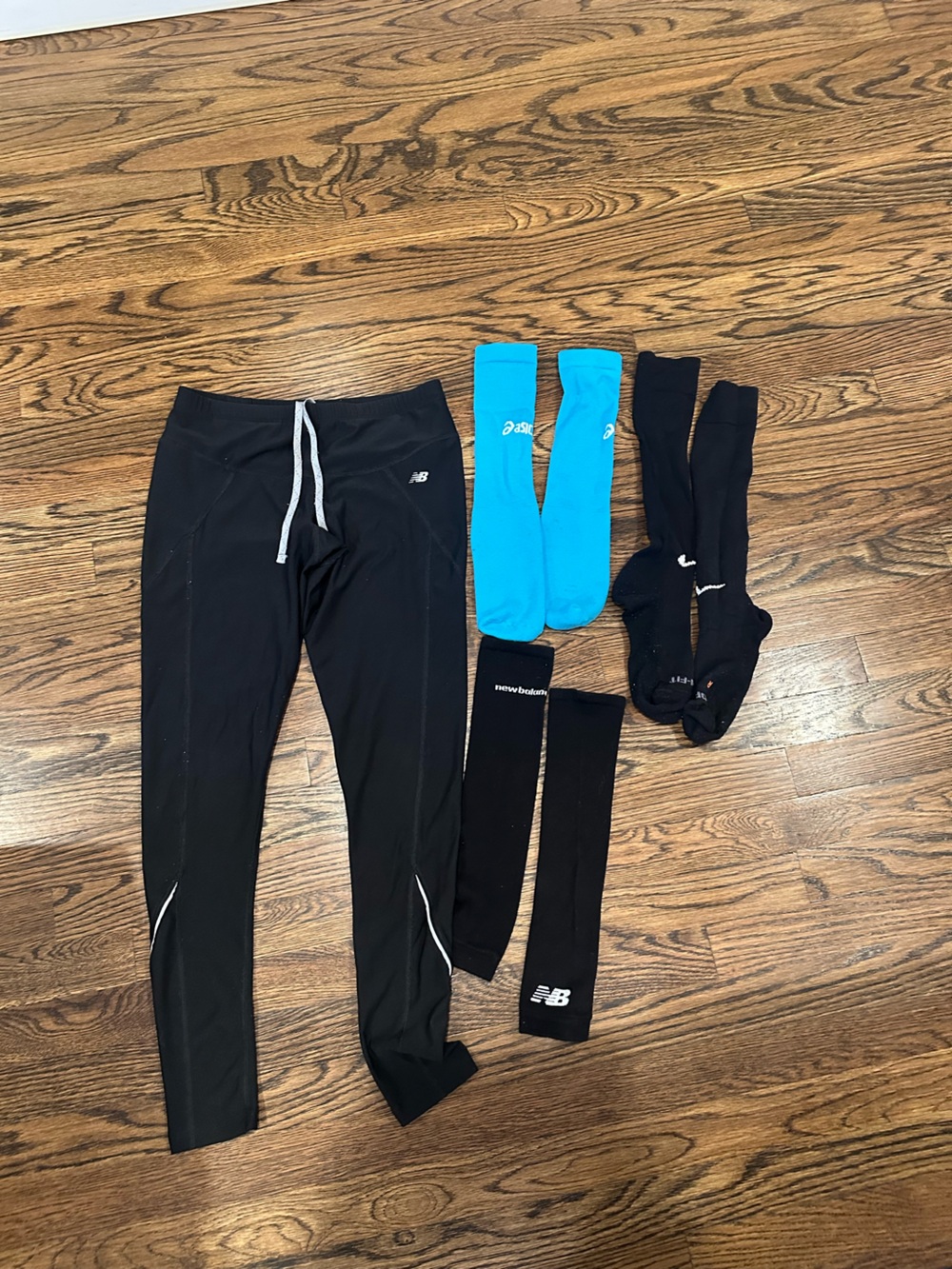 New Balance Black Running Tights with Bright Blue Arm Sleeves and Running Socks